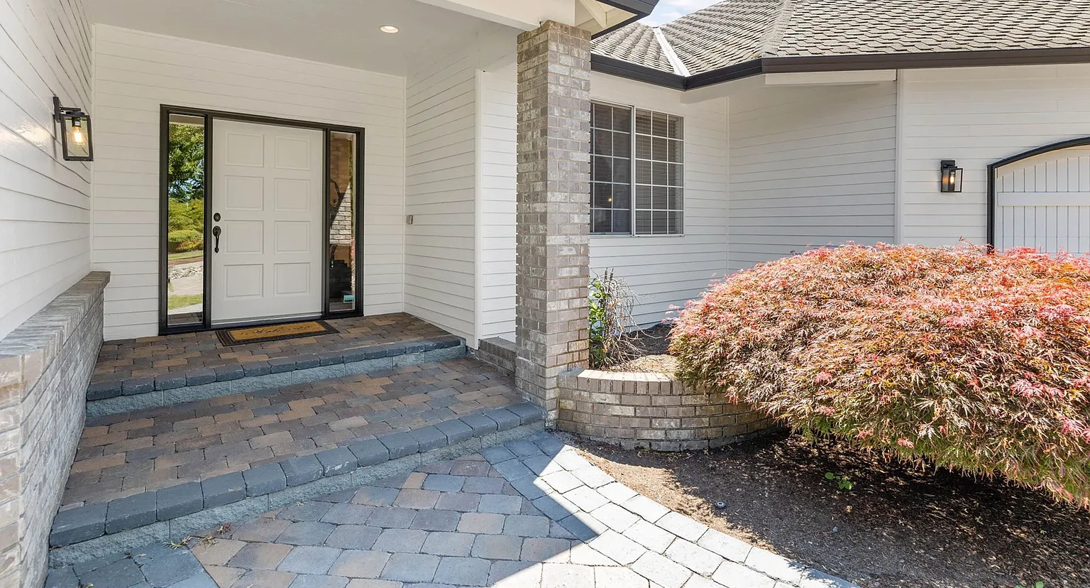 Paver Steps Main Entrance Paver walkway and steps at a finished front entrance