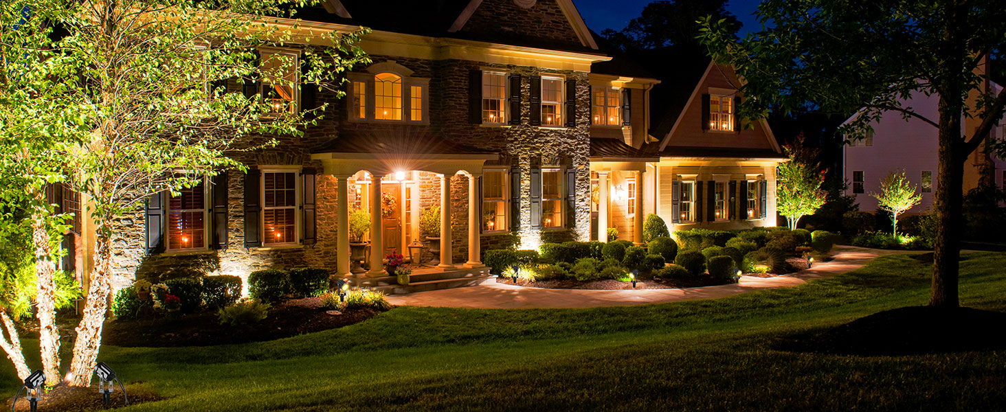 Landscape lighting along a residential entry