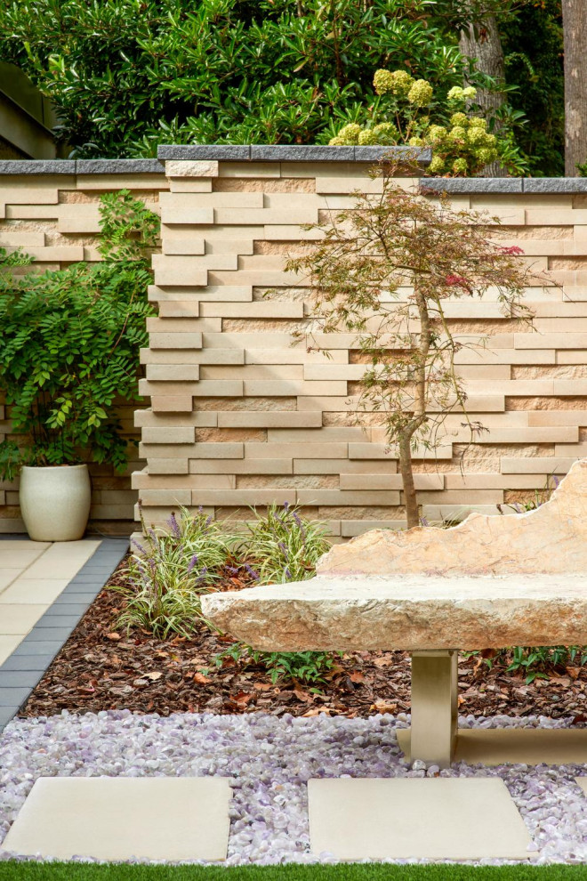 Retaining wall integrated into a residential landscape