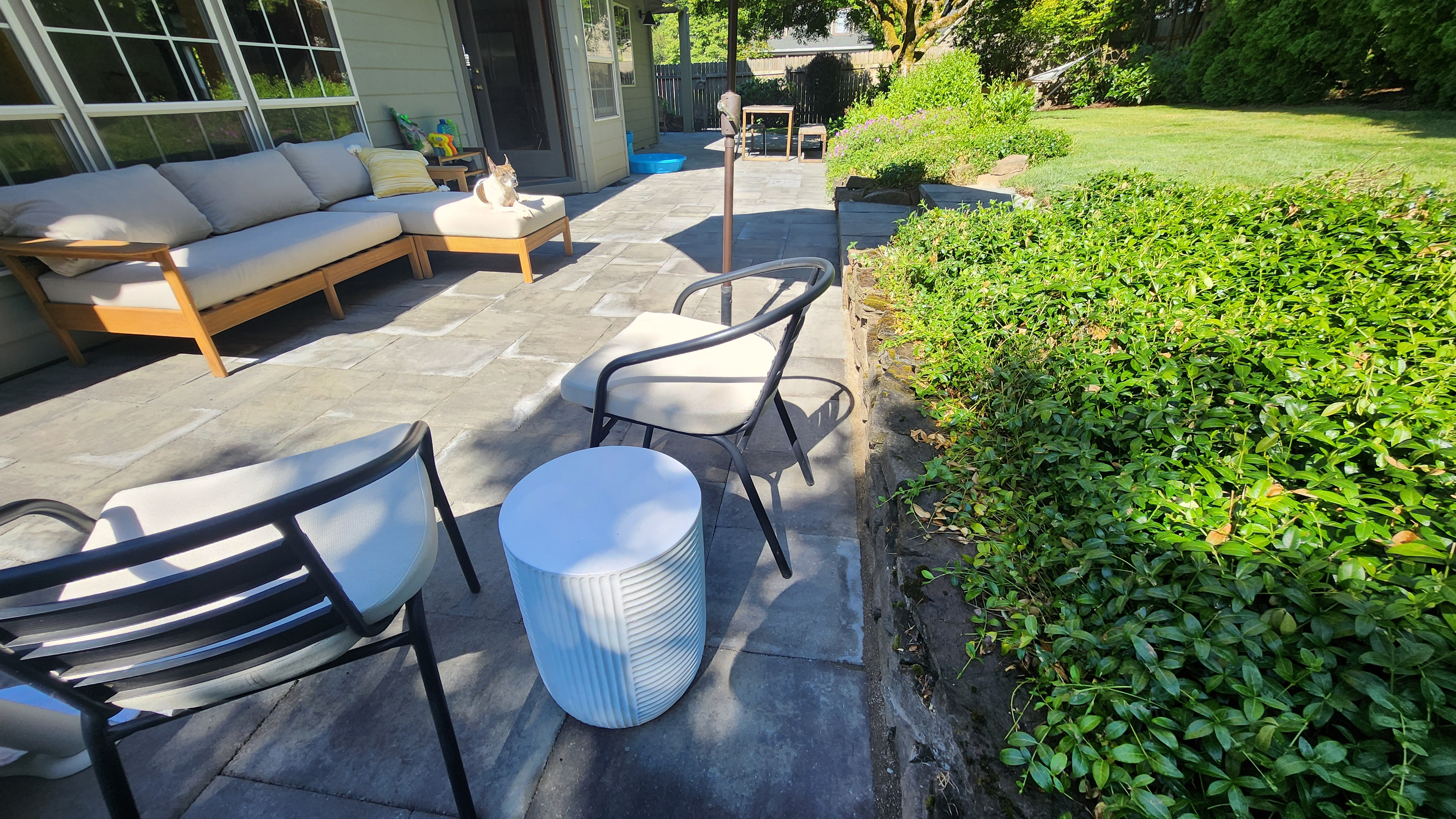 patio-after2 Stone patio seating area beside an established garden